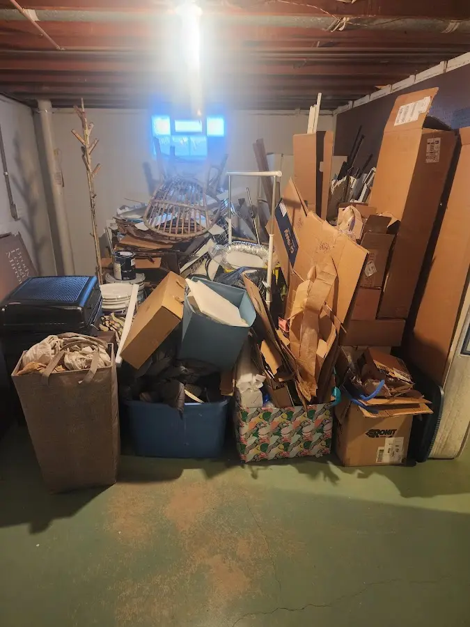 Roll-off dumpster container at job site for 2 Yard Dumpster Rental in Knik-Fairview